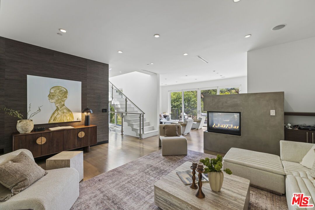 Dining room, Fireplace, Interior, Living room, Recessed Lighting, Wood Texture Flooring