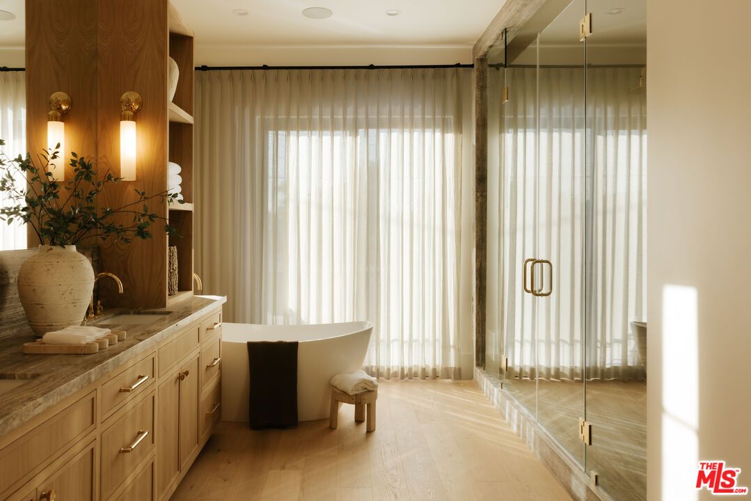 Bathroom, Free Standing Baths, Glass Shower, Interior, Recessed Lighting, Wood Texture Flooring