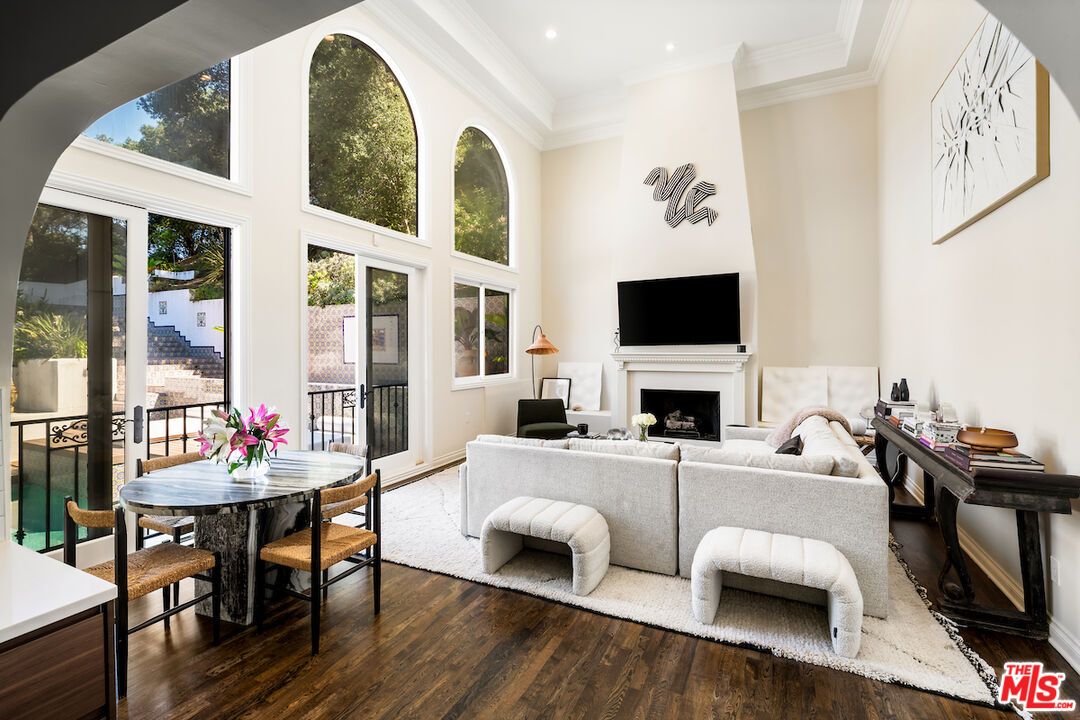 Dining room, Fireplace, Interior, Living room, Recessed Lighting, Wood Texture Flooring