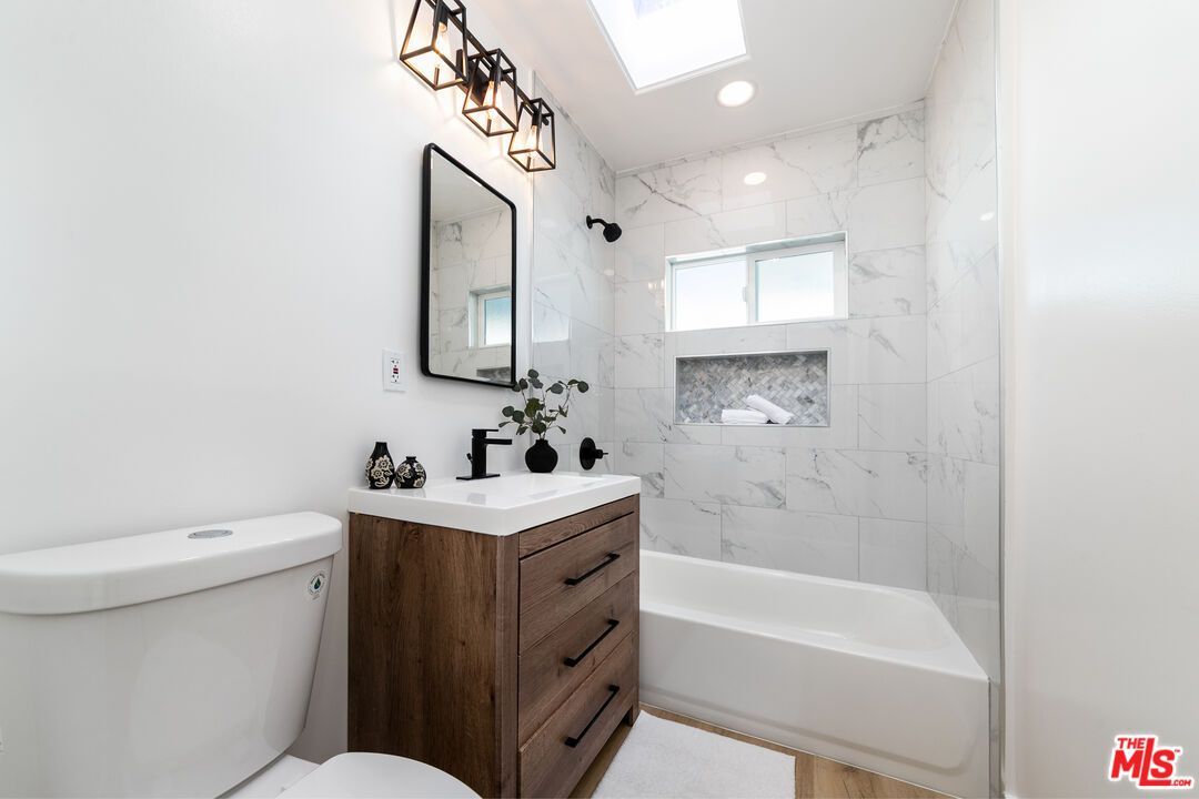 Bathroom, Dual Sink Vanities, Interior, Marble Walls, Recessed Lighting