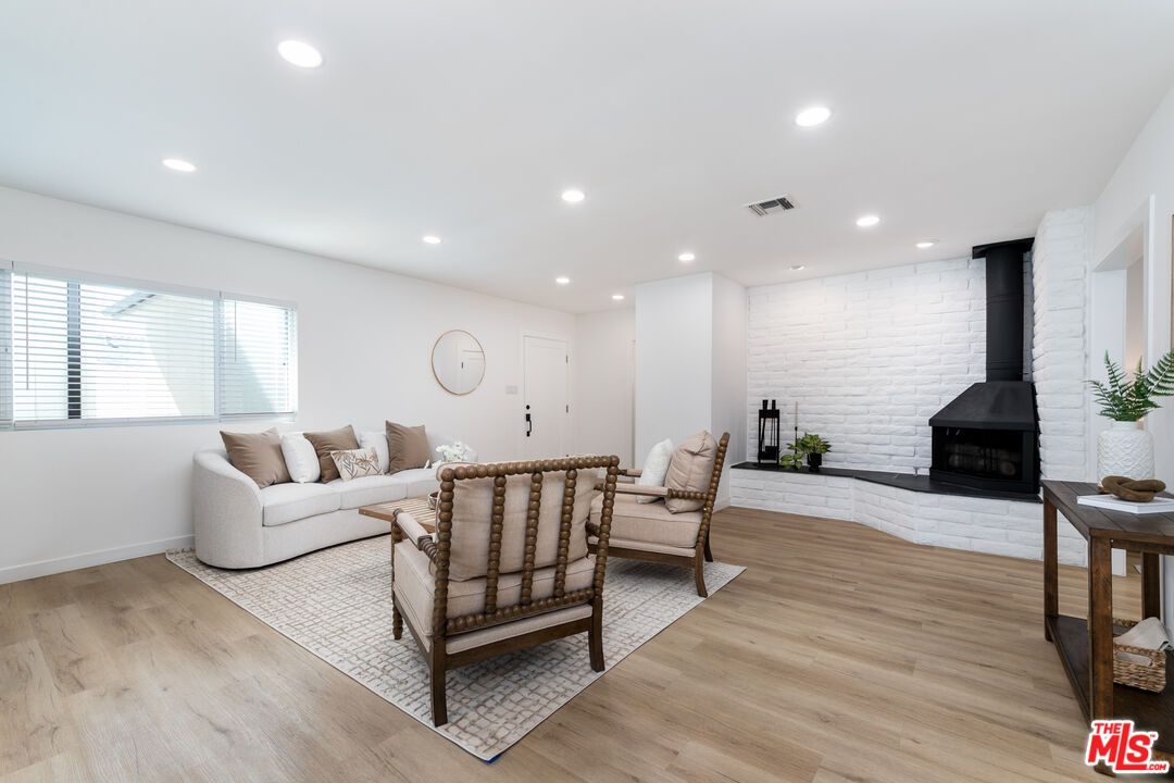 Fireplace, Interior, Living room, Recessed Lighting, Wood Texture Flooring