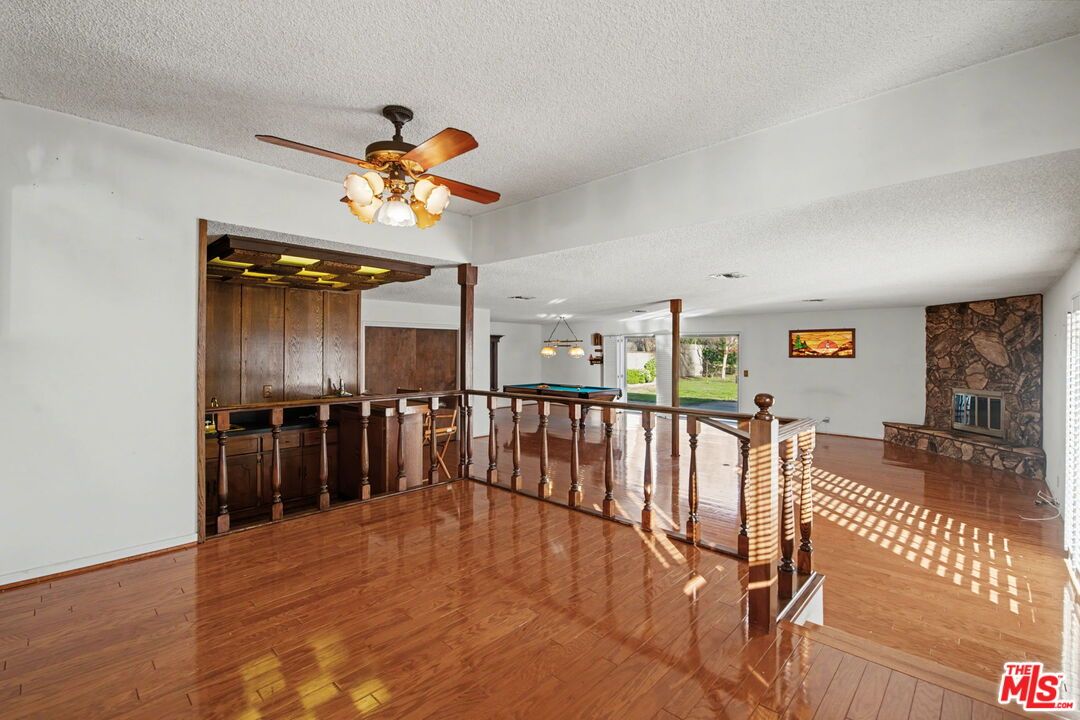 Fireplace, Interior, Pendant Lights, Stone Walls, Wood Texture Flooring