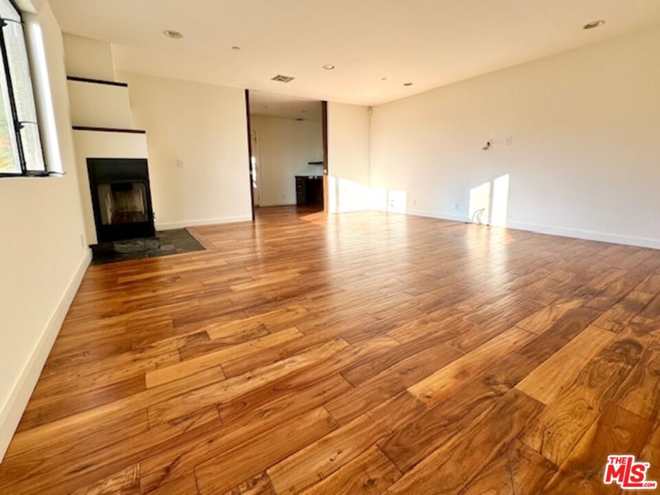 Empty room, Fireplace, Interior, Recessed Lighting, Wood Texture Flooring