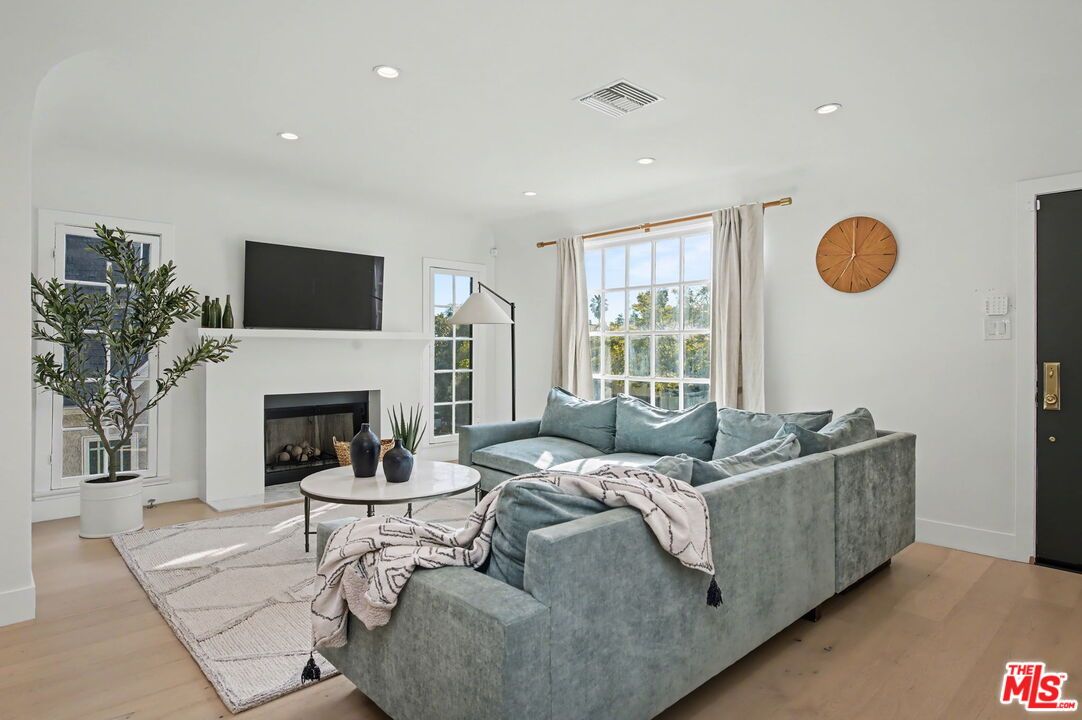 Fireplace, Interior, Living room, Recessed Lighting, Wood Texture Flooring