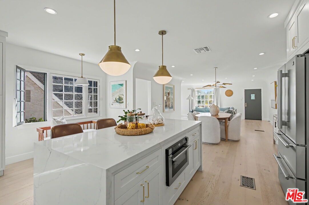 Dining room, Interior, Kitchen, Living room, Pendant Lights, Recessed Lighting, Stainless Steel Appliances, Wood Texture Flooring