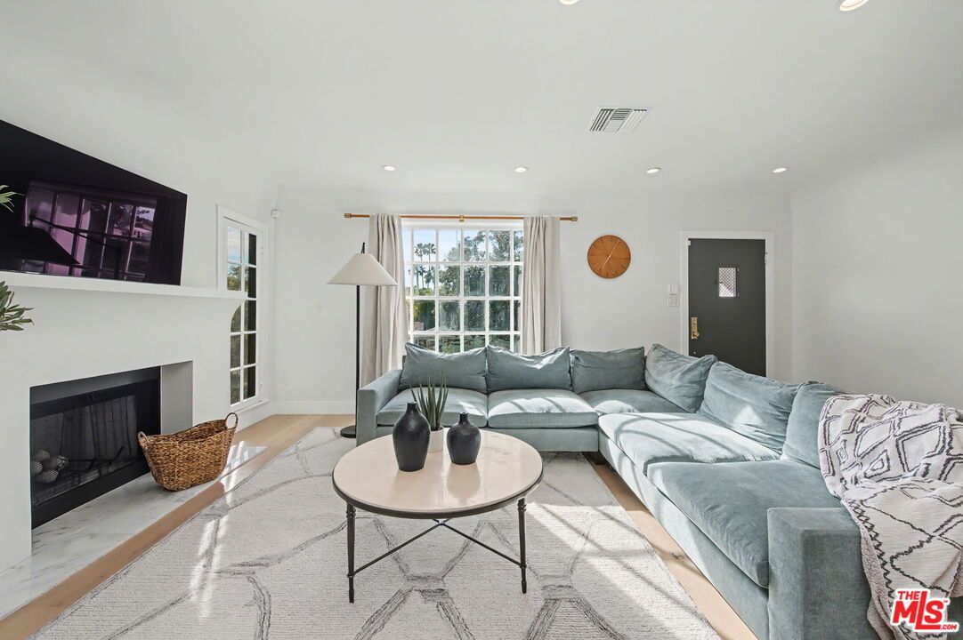 Fireplace, Interior, Living room, Recessed Lighting, Wood Texture Flooring