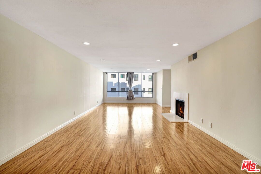 Empty room, Fireplace, Interior, Recessed Lighting, Wood Texture Flooring
