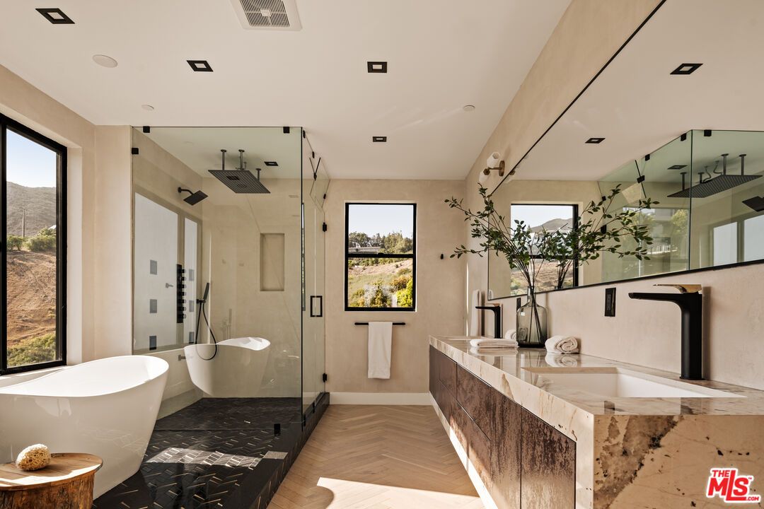 Bathroom, Dual Sink Vanities, Free Standing Baths, Glass Shower, Interior, Recessed Lighting, Wood Texture Flooring