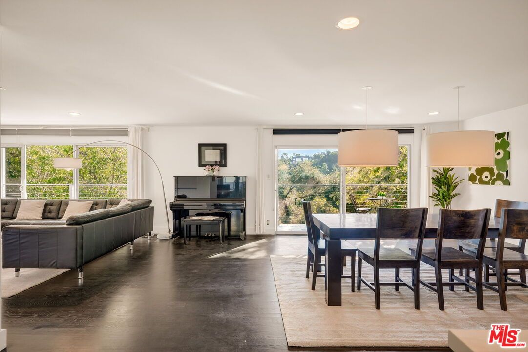 Dining room, Interior, Living room, Pendant Lights, Piano, Recessed Lighting, Wood Texture Flooring