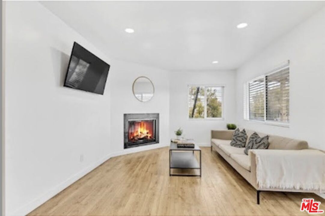 Fireplace, Interior, Living room, Recessed Lighting, Wood Texture Flooring