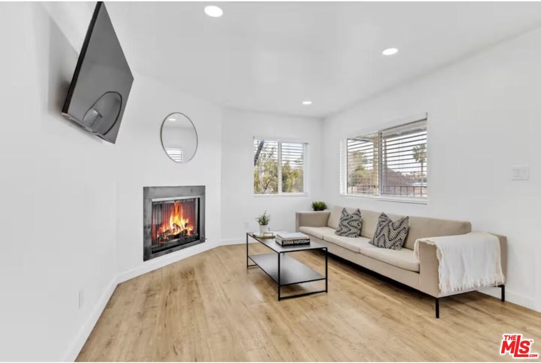 Fireplace, Interior, Living room, Recessed Lighting, Wood Texture Flooring