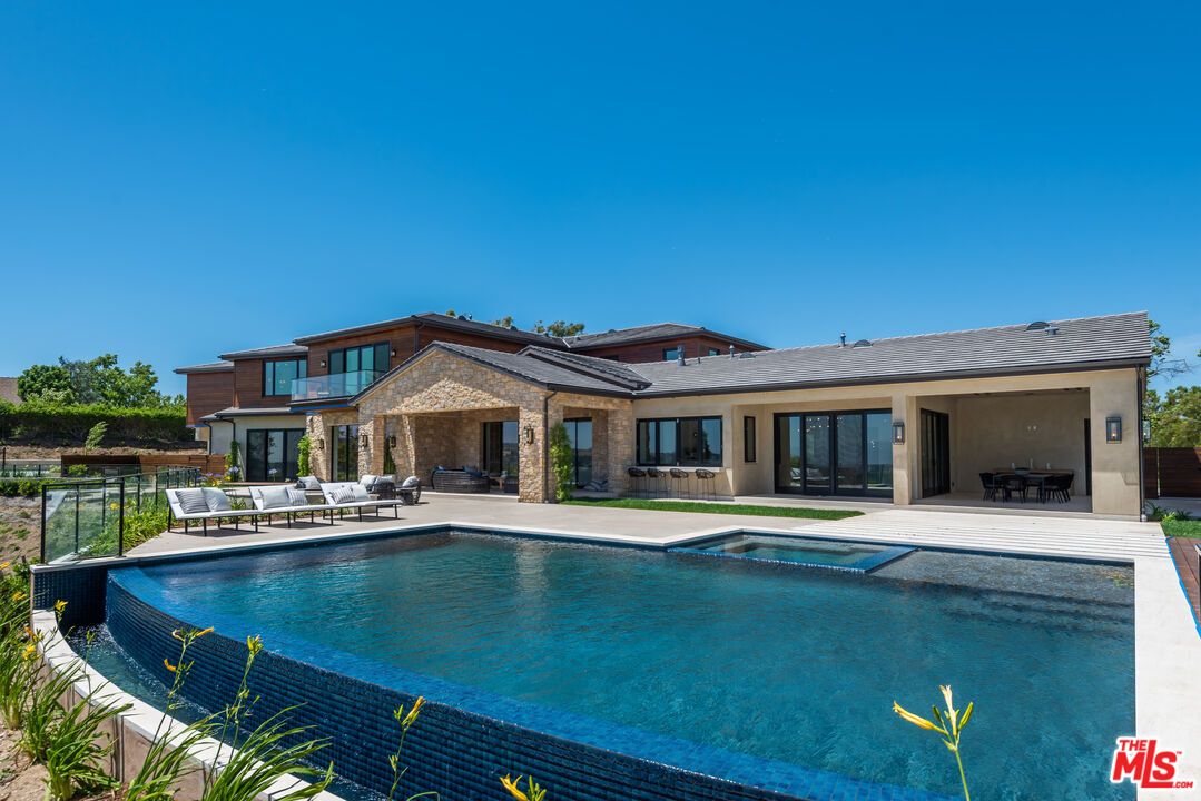 Exterior, Pool, Solar Panels