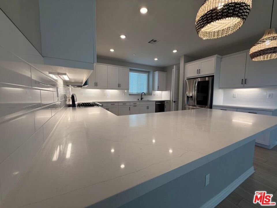Chandelier, Interior, Kitchen, Recessed Lighting, Stainless Steel Appliances, Wood Texture Flooring
