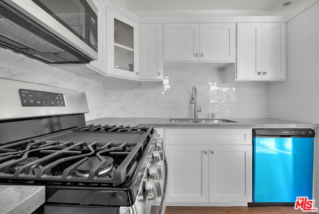 Interior, Kitchen, Marble Walls, Stainless Steel Appliances, Wood Texture Flooring