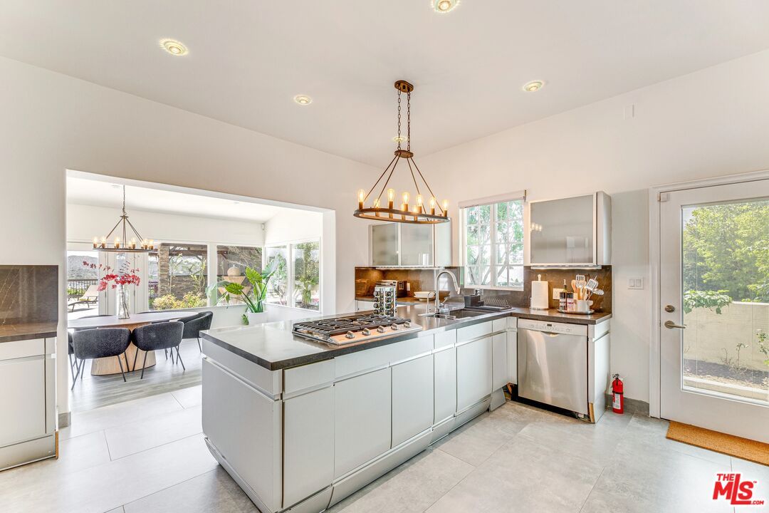 Chandelier, Dining room, Interior, Kitchen, Pendant Lights, Recessed Lighting, Stainless Steel Appliances