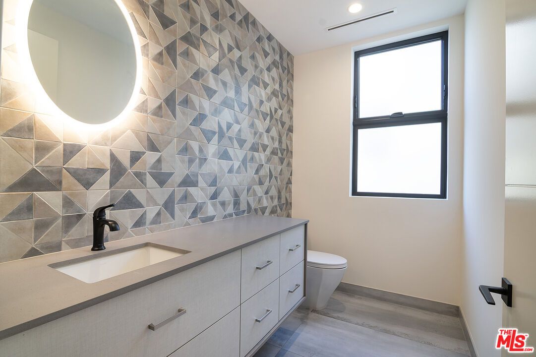 Bathroom, Dual Sink Vanities, Interior, Recessed Lighting, Wood Texture Flooring