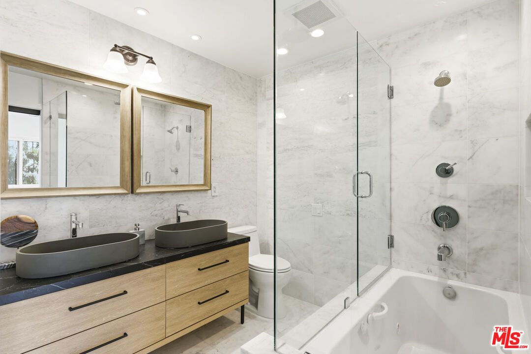 Bathroom, Dual Sink Vanities, Glass Shower, Interior, Marble Walls, Recessed Lighting