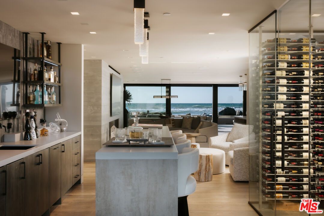 Interior, Living room, Pendant Lights, Recessed Lighting, Water, Wine Storage, Wood Texture Flooring
