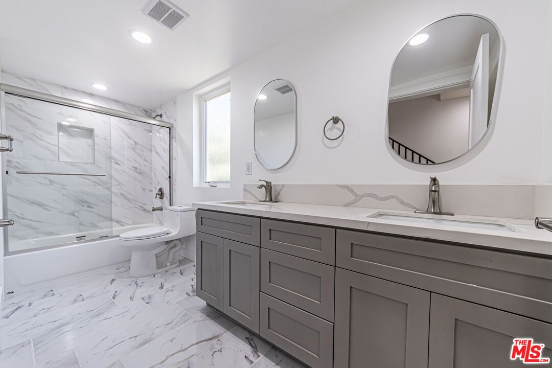 Bathroom, Dual Sink Vanities, Interior, Marble, Marble Walls, Recessed Lighting