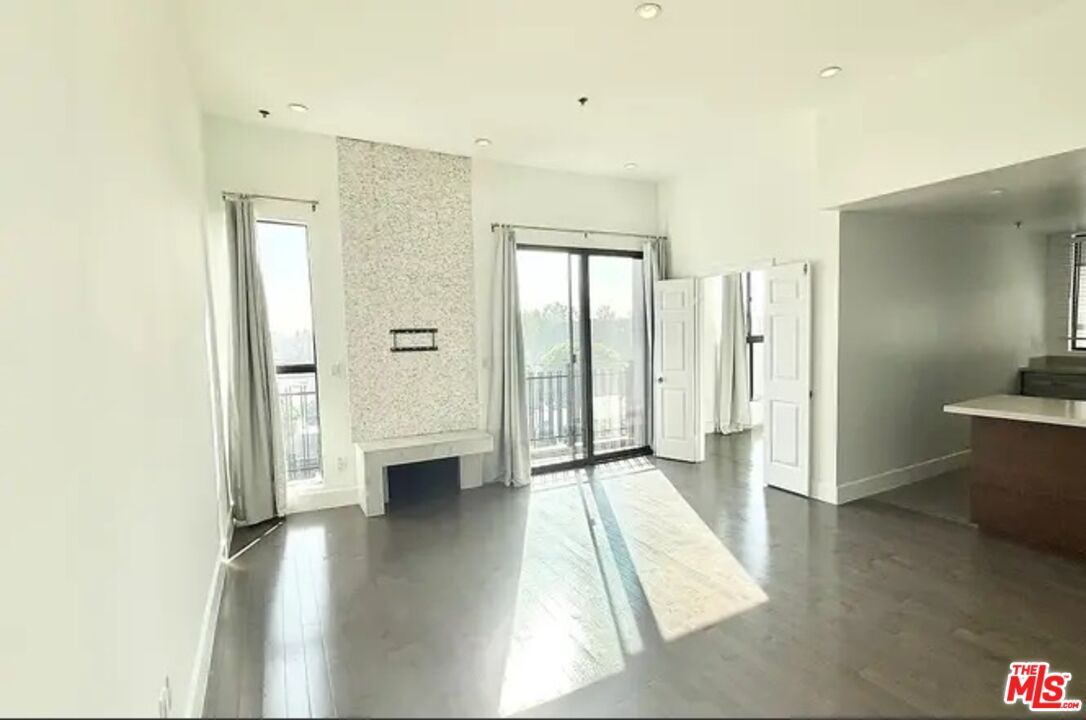 Empty room, Fireplace, Interior, Recessed Lighting, Wood Texture Flooring