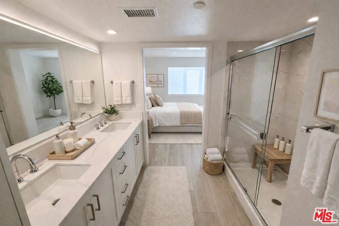 Bathroom, Bedroom, Dual Sink Vanities, Glass Shower, Interior, Marble Walls, Recessed Lighting, Wood Texture Flooring