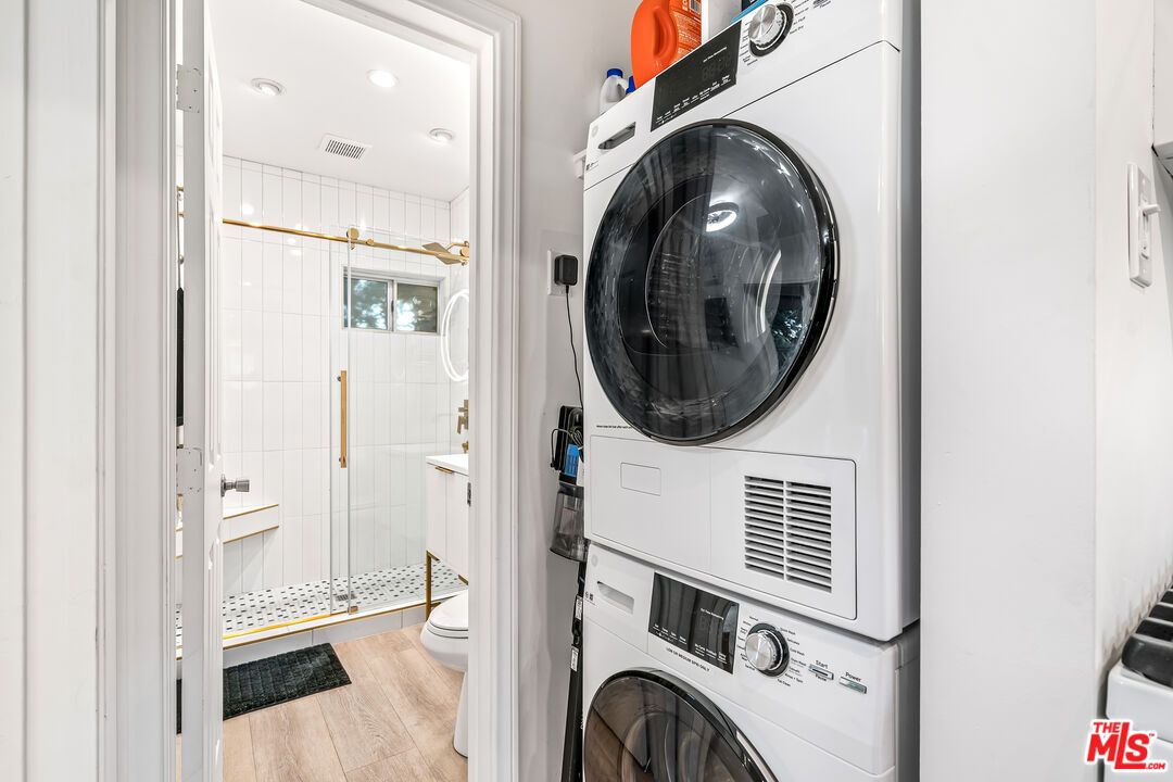 Bathroom, Interior, Recessed Lighting, Utility Closets, Washer, Wood Texture Flooring