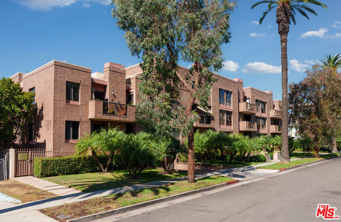 Exterior, Facade, Brick Facade, Condo Building