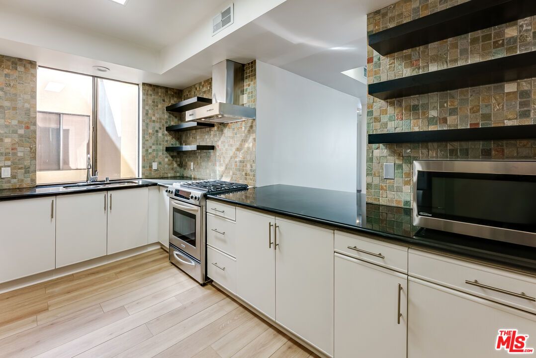 Interior, Kitchen, Stainless Steel Appliances, Stone Walls, Wood Texture Flooring