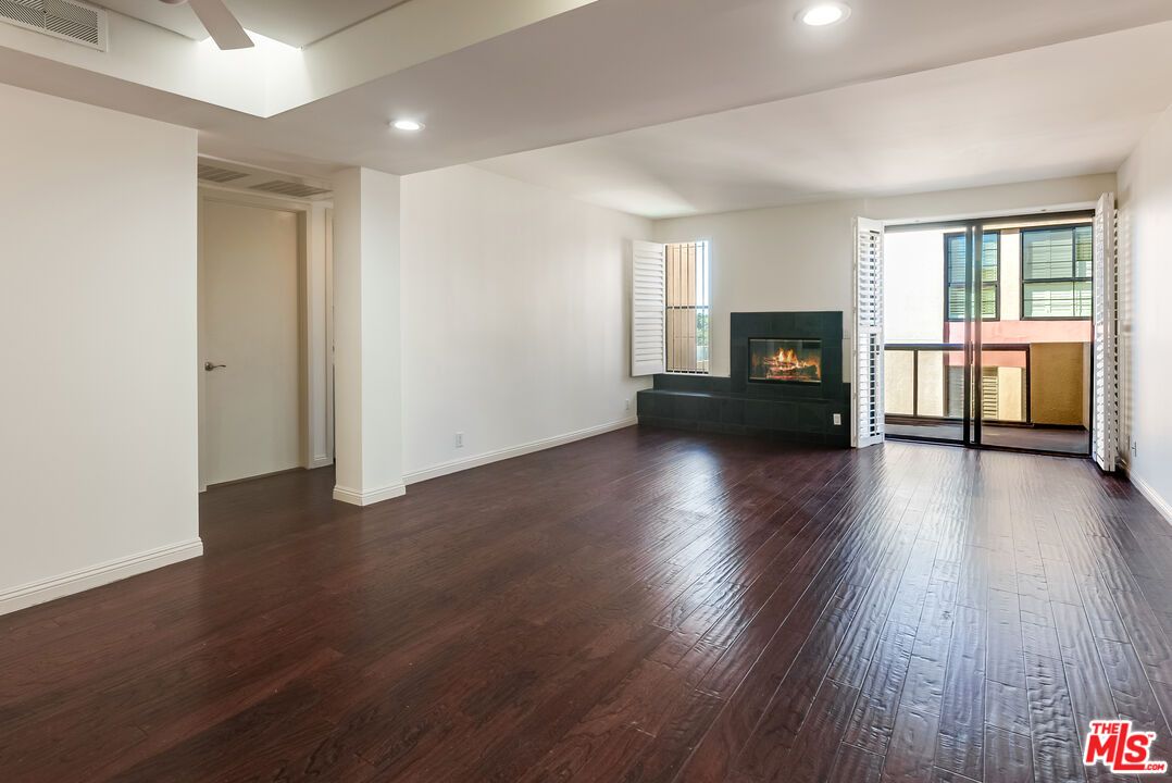 Empty room, Fireplace, Interior, Recessed Lighting, Wood Texture Flooring