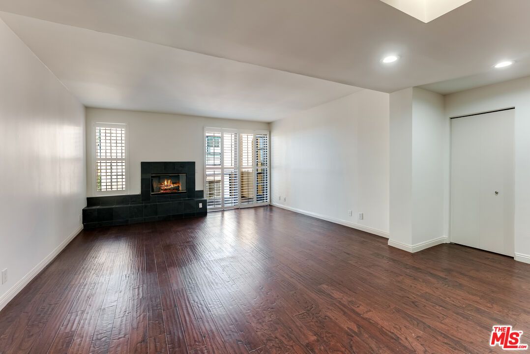Empty room, Fireplace, Interior, Recessed Lighting, Wood Texture Flooring