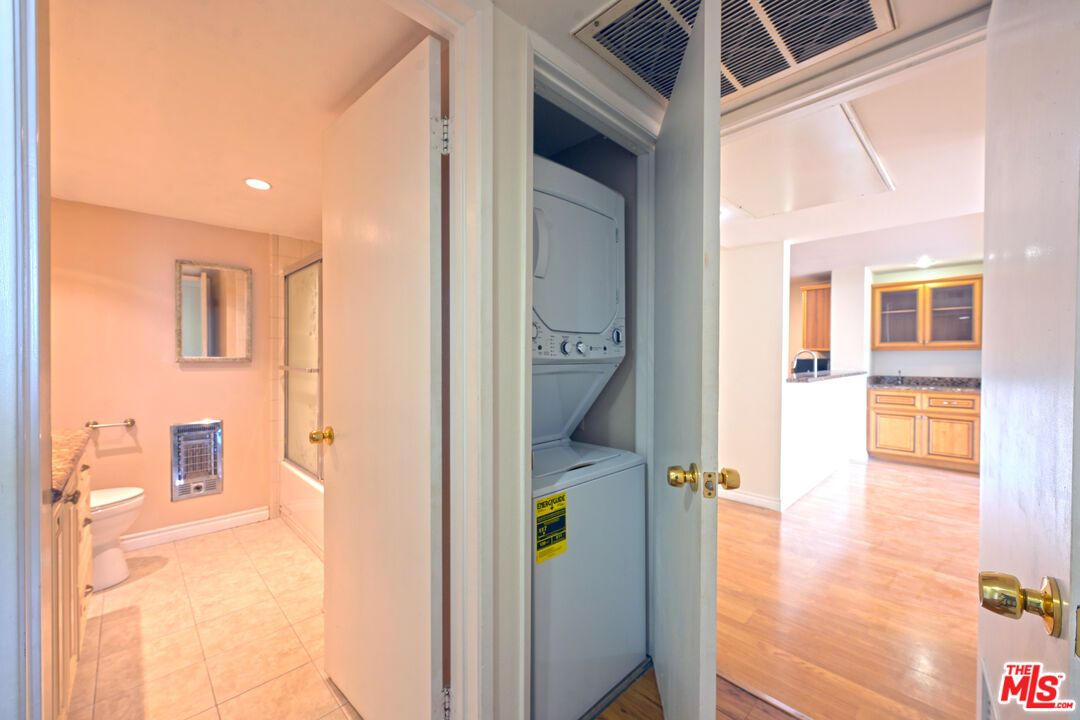 Bathroom, Interior, Recessed Lighting, Utility Closets, Washer, Wood Texture Flooring