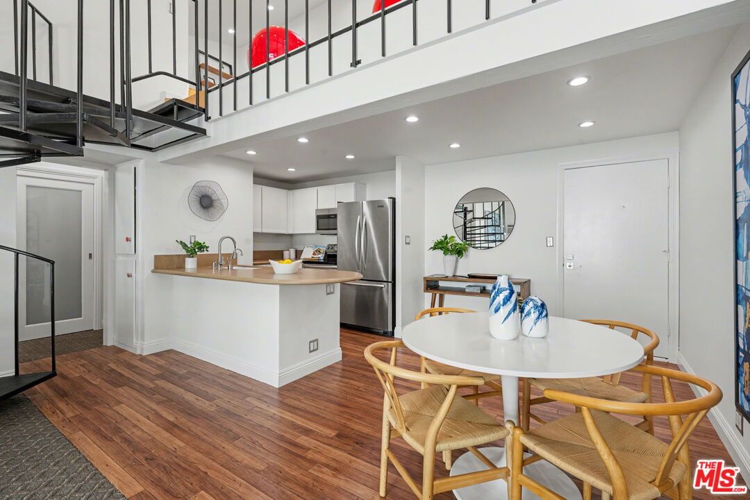 Dining room, Interior, Kitchen, Recessed Lighting, Stainless Steel Appliances, Wood Texture Flooring
