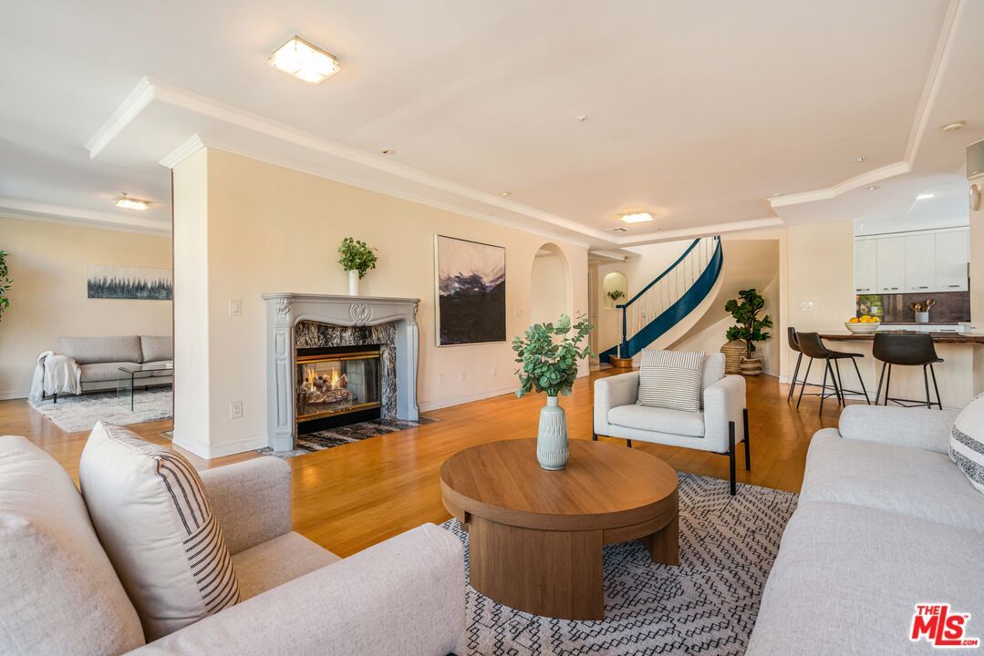 Dining room, Fireplace, Interior, Living room, Recessed Lighting, Wood Texture Flooring