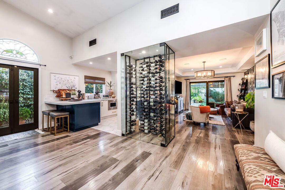 Chandelier, Dining room, Interior, Living room, Pendant Lights, Recessed Lighting, Wine Storage, Wood Texture Flooring