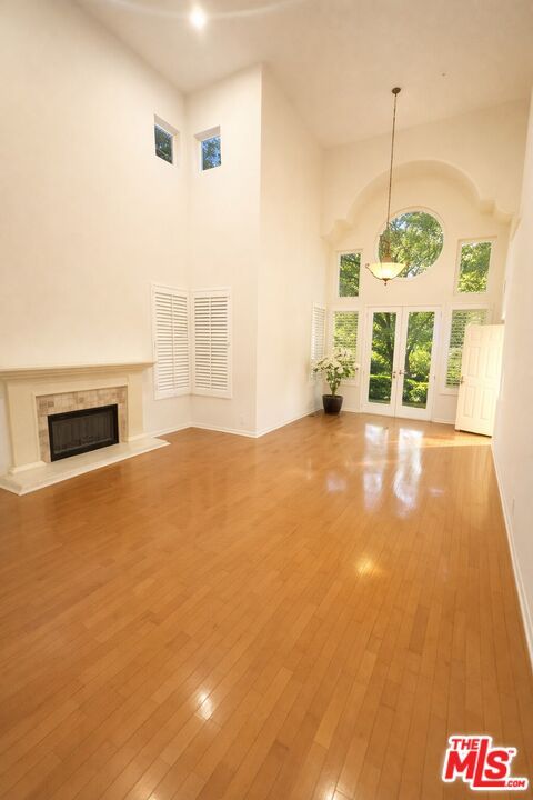 Empty room, Fireplace, Interior, Pendant Lights, Recessed Lighting, Wood Texture Flooring