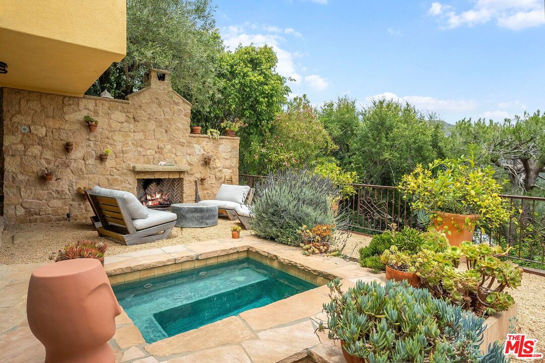 Exterior, Fireplace, Pool