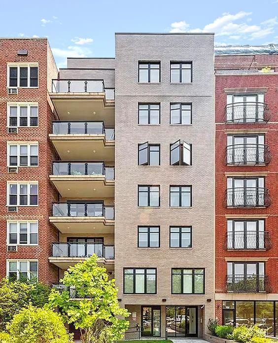 Exterior, Facade, Brick Facade, Condo Building