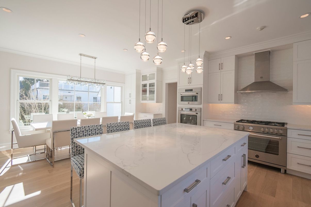 Dining room, Interior, Kitchen, Pendant Lights, Recessed Lighting, Stainless Steel Appliances, Wood Texture Flooring