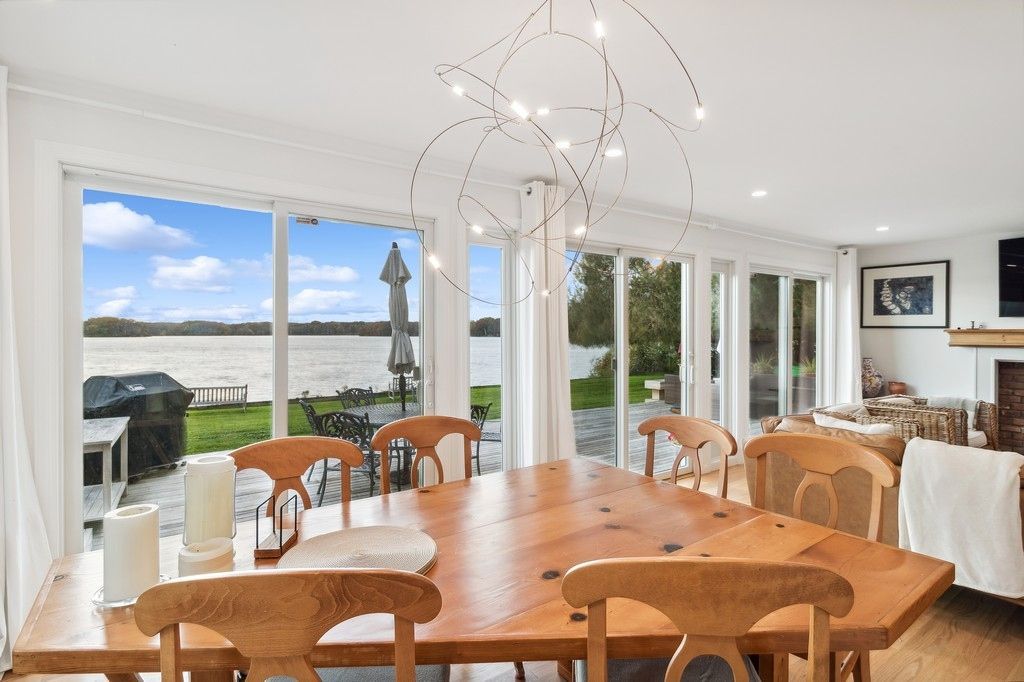 Dining room, Fireplace, Interior, Recessed Lighting, Water, Wood Texture Flooring