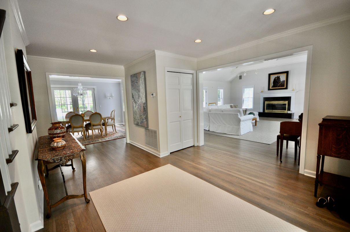Dining room, Fireplace, Interior, Living room, Recessed Lighting, Wood Texture Flooring