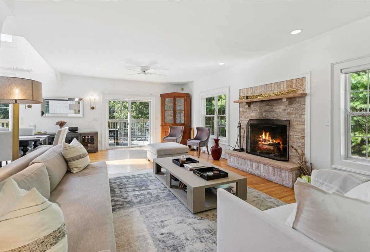 Dining room, Fireplace, Interior, Living room, Recessed Lighting, Wood Texture Flooring