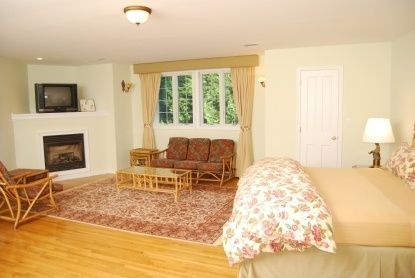Bedroom, Fireplace, Interior, Recessed Lighting, Wood Texture Flooring