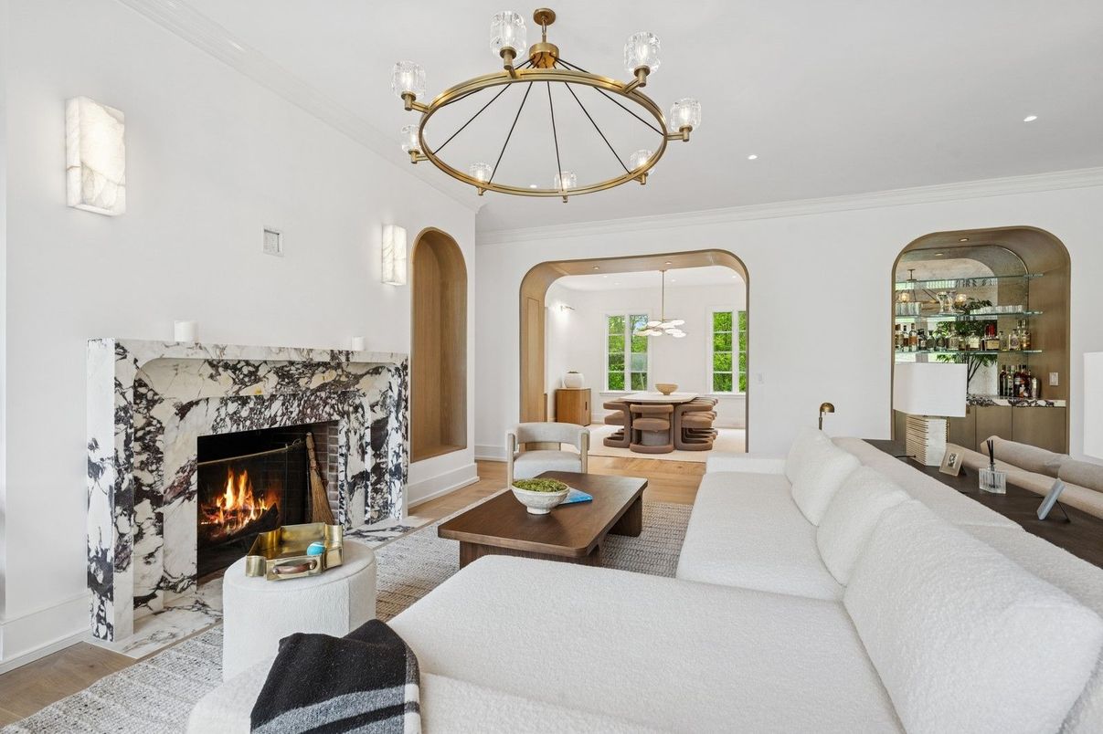 Chandelier, Fireplace, Interior, Living room, Pendant Lights, Recessed Lighting, Wood Texture Flooring