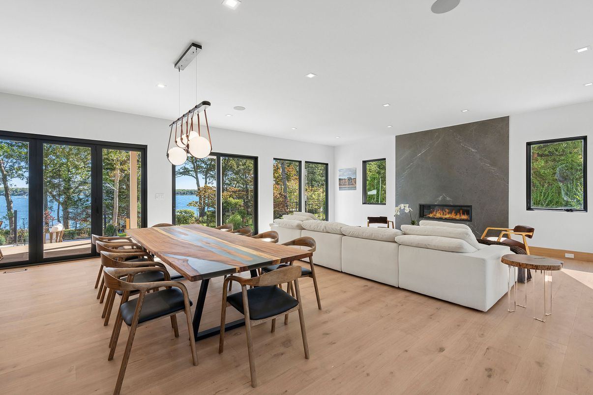 Dining room, Fireplace, Interior, Living room, Pendant Lights, Recessed Lighting, Wood Texture Flooring