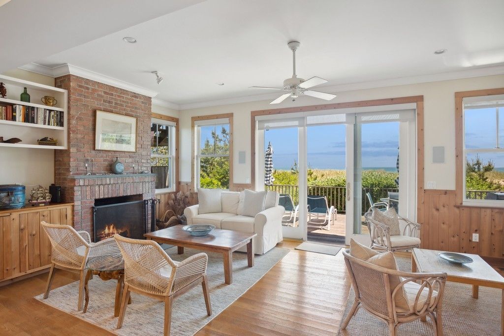 Fireplace, Interior, Living room, Recessed Lighting, Stone Walls, Water, Wood Texture Flooring