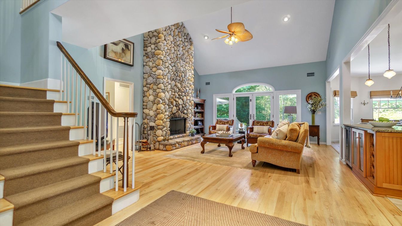 Fireplace, Interior, Living room, Pendant Lights, Recessed Lighting, Stone Walls, Wood Texture Flooring