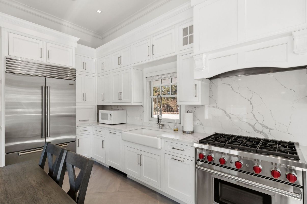 Interior, Kitchen, Marble Walls, Recessed Lighting, Stainless Steel Appliances