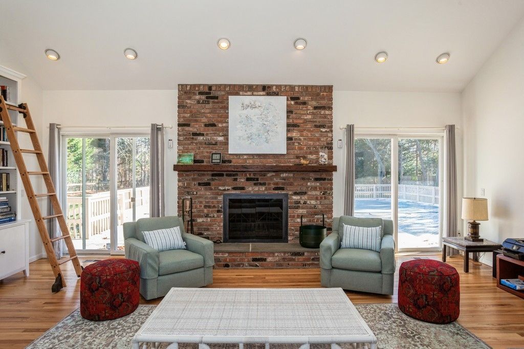 Fireplace, Interior, Living room, Recessed Lighting, Stone Walls, Wood Texture Flooring