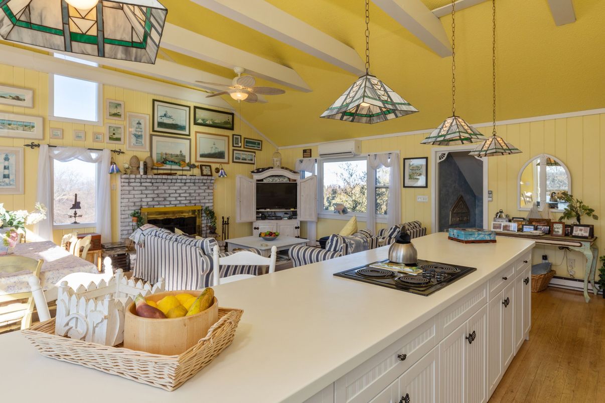 Dining room, Fireplace, Interior, Kitchen, Pendant Lights, Wood Texture Flooring