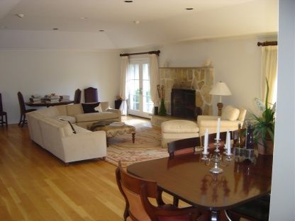 Dining room, Fireplace, Interior, Living room, Recessed Lighting, Wood Texture Flooring